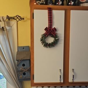 Festive Green Holiday Wreath with Red Bow